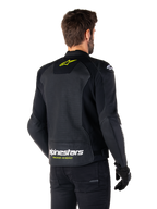 Alpinestars Faster V3 Airflow læderjakke, sort, hvid og gul fluo, set bagfra, med et stort perforeret læderrygpanel til ventilation, gult stjernelogo på kraven og hvidt Alpinestars-logo med gul 'Racing Ahead'-tekst på den nederste kant, sport motorcykelkøreudstyr