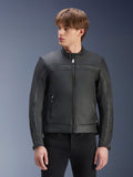 Alpinestars Dyno Leather Jacket, Black, premium bovine leather motorcycle jacket, worn by model with black pants, heritage-inspired design with central zipper and low-profile stand-up collar, urban contemporary motorcycle apparel.