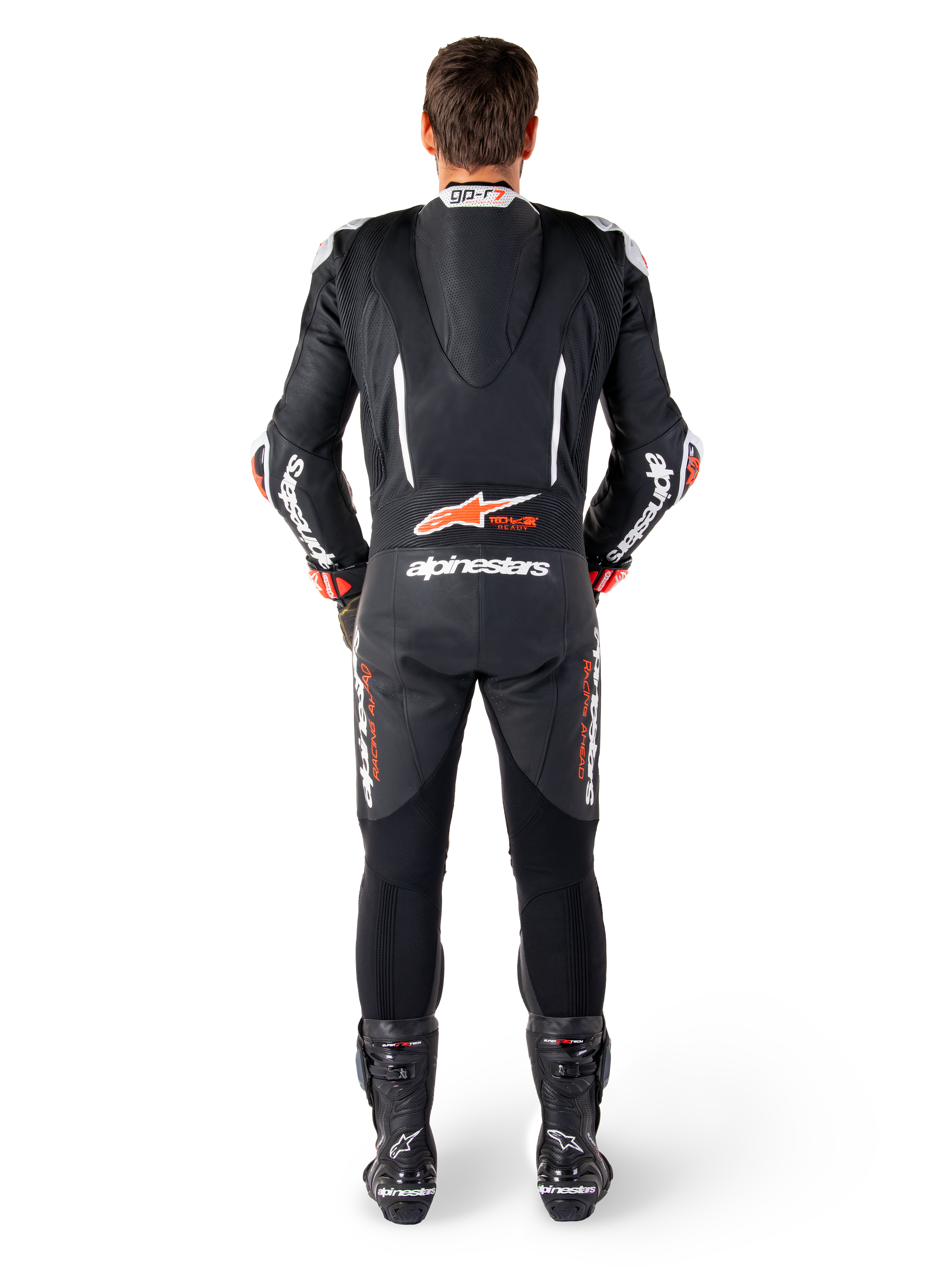 Alpinestars GP-R7 læderdragt, sort og hvid racingdragt med aerodynamisk pukkel og harmonikapaneler.