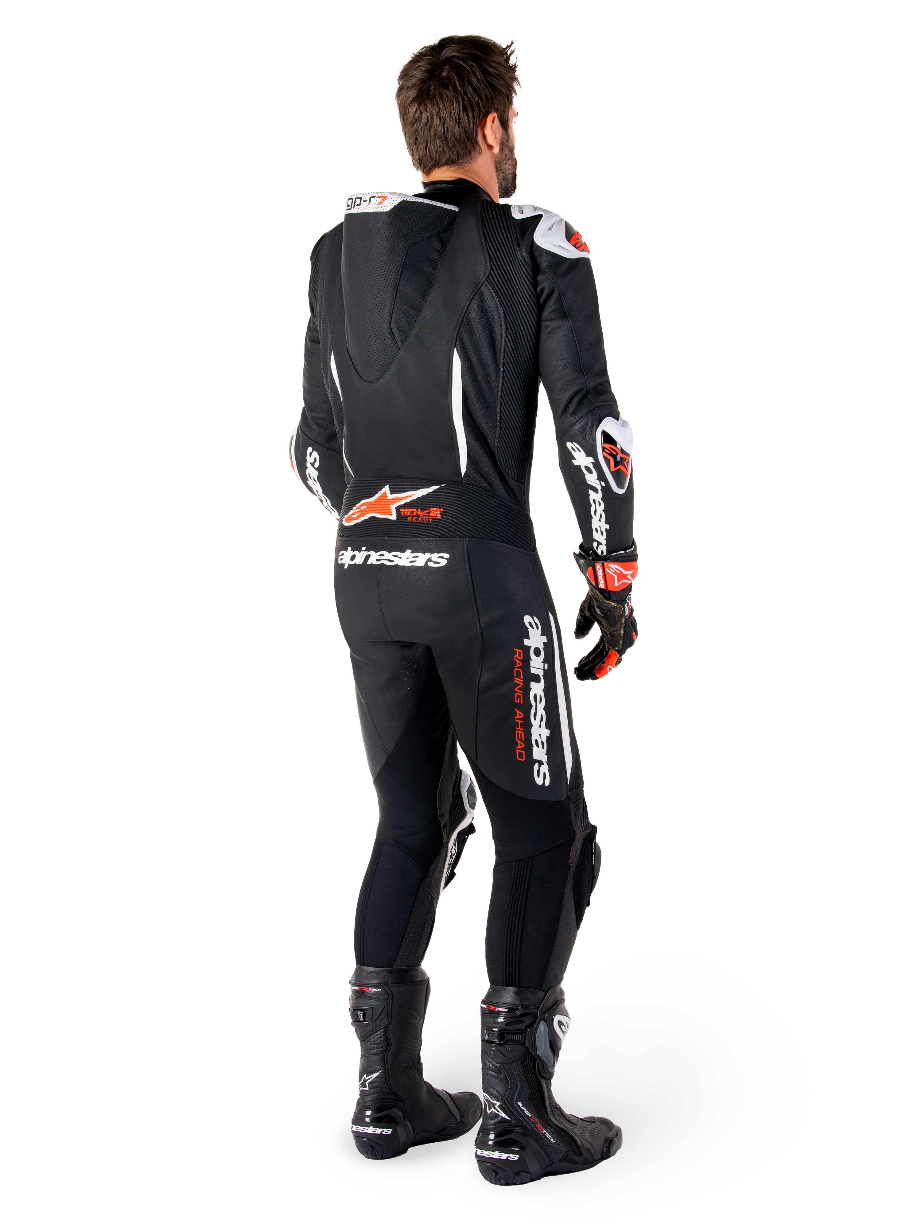 Alpinestars GP-R7 1-stk læderdragt, herreracerdragt i sort og rød fluo med aerodynamisk pukkel og Tech-Air Ready-logo.