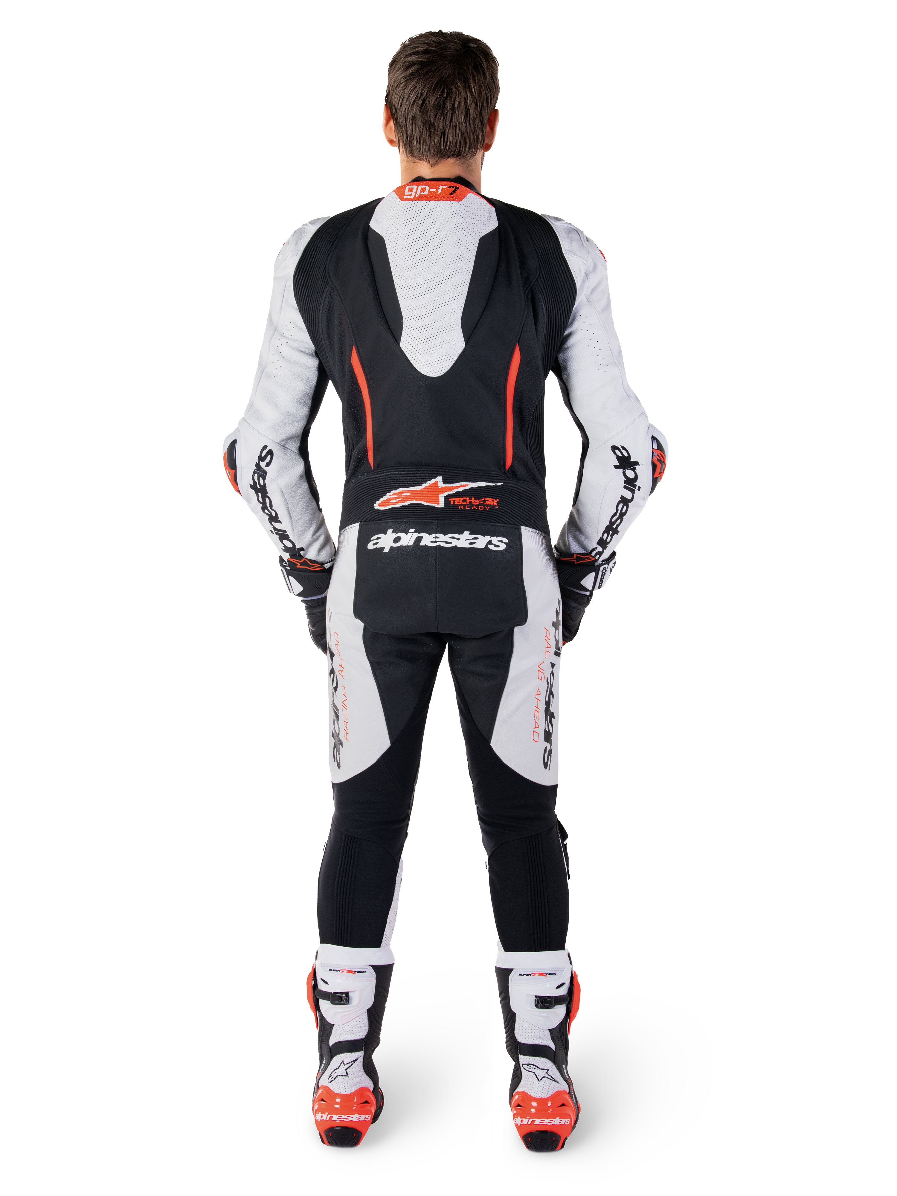 Alpinestars GP-R7 læderdragt 1-stk, motorcykelracerdragt med aerodynamisk pukkel, hvid, sort og rød, i bovinlæder set bagfra.