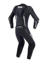 Alpinestars Woman Stella GP-R7 1-Piece Leather Suit, Black, back view showing aerodynamic speed hump, white Alpinestars branding on sleeves and legs, and Tech-Air® ready logo, professional women's motorcycle racing suit.