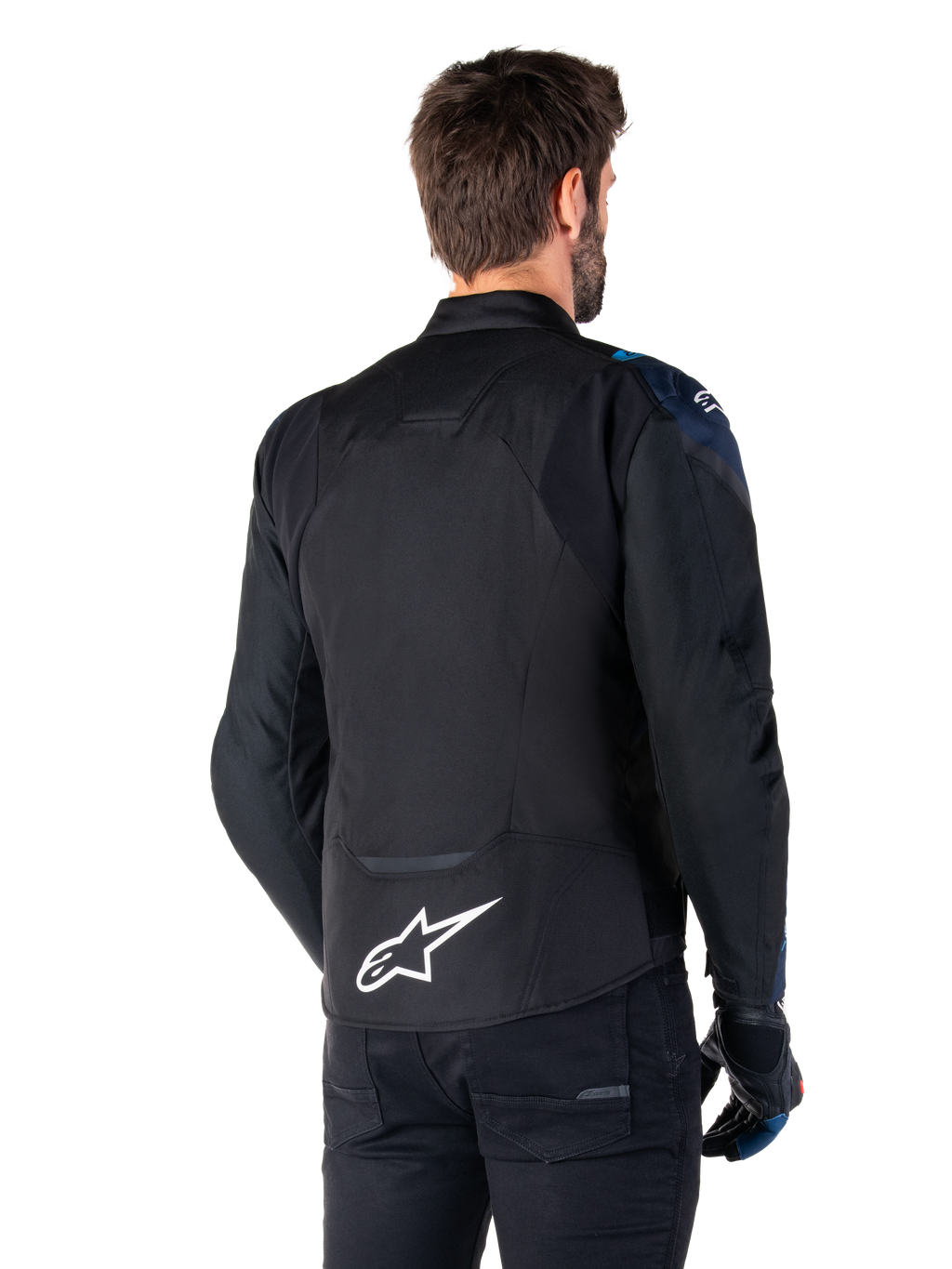 Alpinestars T-Jaws V4 Waterproof Jacket, set bagfra, sort med mørkeblå og Blithe Blue-detaljer, hvidt stjernelogo på lænden, sportslig silhuet, bæres med sorte bukser og kørehandsker