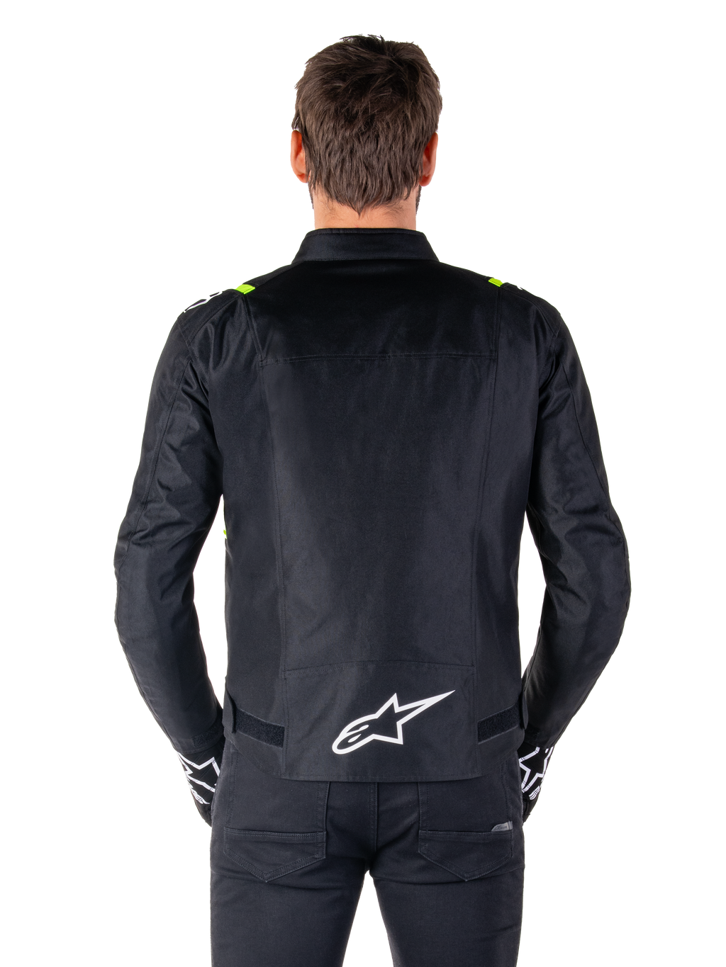 Alpinestars T-SPS V2 Waterproof Jacket, Back View, Black with Yellow Fluo accents on shoulders and white star logo on the lower back, Textile motorcycle jacket with a sport silhouette, Worn by male model.