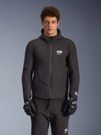 Alpinestars Aeroshell Waterproof Jacket, Black, Motorcycle Urban Jacket, Hooded Design with Full Front Zipper, White Logos on Chest and Sleeves, Worn with Matching Black Pants and Gloves