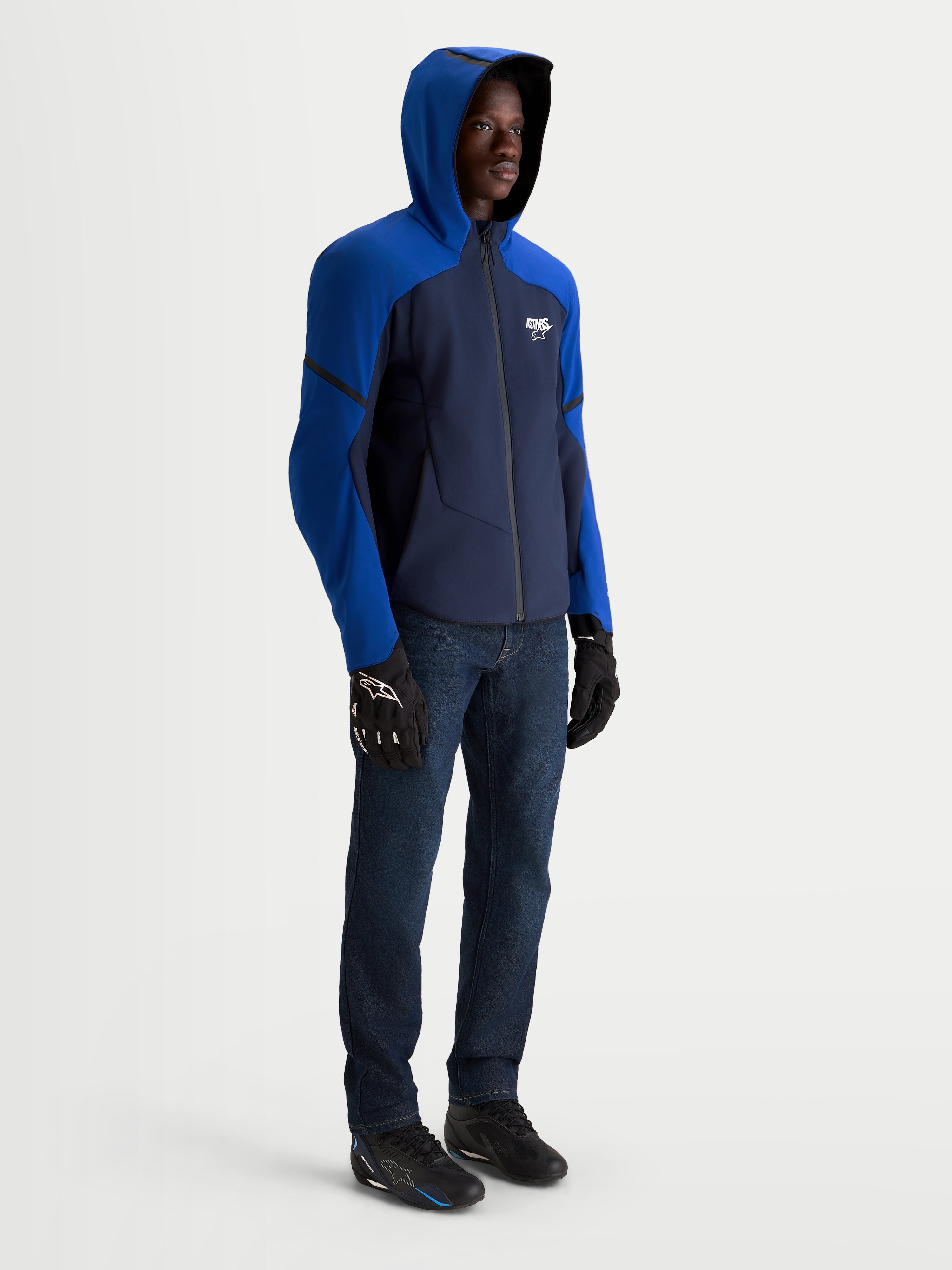 Alpinestars Aeroshell Waterproof Jacket, Men's Night Navy and Bright Blue motorcycle sports softshell jacket with hood, featuring CE certified protection and adaptive stretch fabric