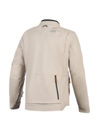 Alpinestars Borrego Drystar® jakke, motorcykeljakke, Warm Gray, set bagfra med et stort bagrum med lynlås, slidstærk tekstillærred-konstruktion med Alpinestars-branding på skulderen, eventyrklart design