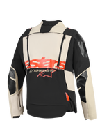 Alpinestars Halo Pro Drystar® XF lamineret jakke, set bagfra, Mastic Black og creme tekstilkonstruktion, markant rødt 'stars'-logo hen over midten, dobbelte lodrette lynlåse til modulær ventilation, teknisk adventure motorcykelbeklædning