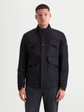 Altan Drystar® Jacket, men's urban contemporary waterproof motorcycle field jacket in black, front view on a model showing the matte polyfabric construction, dual-entry cargo pockets, and ergonomic warm collar.