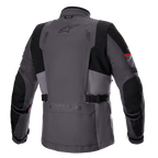 Alpinestars Monteira Drystar® XF jakke, adventure touring motorcykeljakke, mørkegrå og tar-grå med klare røde detaljer, set bagfra med praktisk baglomme, taljeremme og forstærkede sorte paneler på skuldre og albuer, med Astars-logo på den øverste del af ryggen.