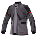 Alpinestars Monteira Drystar XF-jakke, motorcykeljakke til touring, mørkegrå og grå med sorte paneler og klare røde detaljer, med frontlommer, justerbare stropper i taljen og på ærmerne, vertikal Alpinestars-branding og høj krave, designet til adventure-kørsel