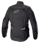 Alpinestars Bogotá Pro Drystar® jakke, set bagfra, sort, tekstil motorcykeljakke med et stort ventilationspanel på ryggen med Alpinestars-logo, 'TECH TOURING'-branding, justerbare taljestropper og harmonika-paneler på albuerne
