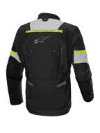 Alpinestars Bogota' Pro Drystar® Jakke, herre-motorcykeljakke til adventure touring, sort, grå og gul fluo, vandtæt tekstil, set bagfra.