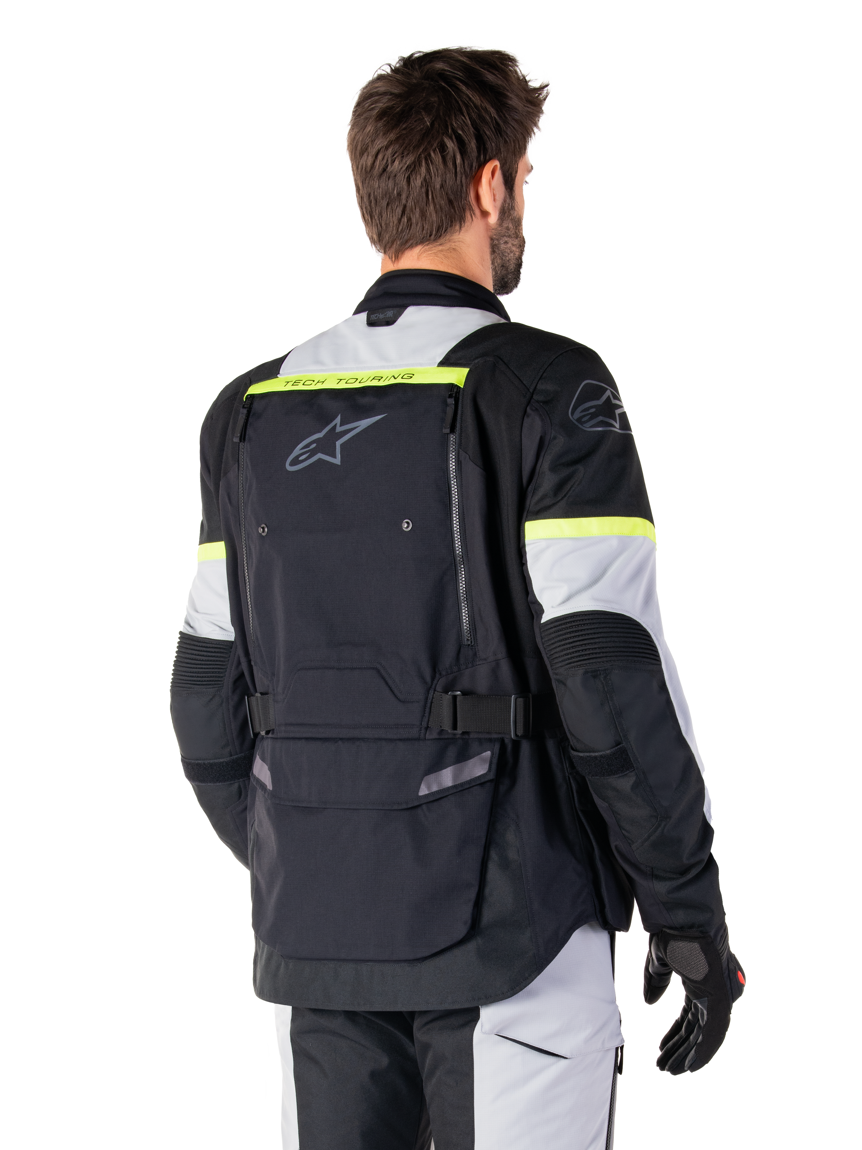 Alpinestars Bogota' Pro Drystar®-jakke, adventure touring-jakke, Black Ice Gray og Yellow Fluo, set bagfra med stort rygpanel med lomme og 'TECH TOURING'-branding, Alpinestars-logo og fluorescerende detaljer, teknisk køreudstyr i tekstil
