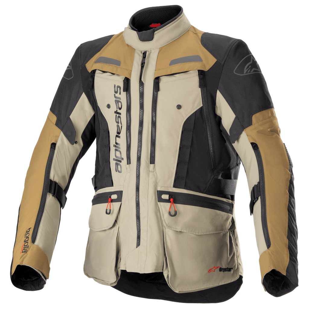 Alpinestars Bogota Pro Drystar-jakke, motorcykel adventure touring-jakke, beige, sort og tan, vandtæt tekstilkonstruktion, flere lommer med røde trækstropper, forstærkede beskyttelsesområder og design med høj krave