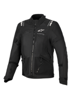 Alpinestars Stella Andes V4 Drystar® jakke, motorcykeljakke til kvinder, sort, set forfra med hvide logoer på brystet og skuldrene, multi-panel tekstildesign med lynlåse og reflekterende detaljer, adventure-touring stil