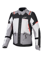 Alpinestars Stella Andes V4 Drystar® dame-motorcykeljakke, grå og sort med koralrøde detaljer, vandtæt adventuretekstil.