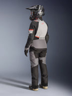 Stella Andes V4 Drystar® Jakke, adventure motorcykeljakke til damer, grå og sort, vandtæt tekstil, set bagfra.