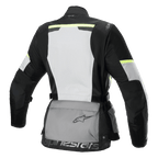 Alpinestars Stella Andes Air Drystar® jakke, touring-motorcykeljakke til damer, set bagfra, Ice Gray, Dark Gray og sort, med et stort hvidt mesh-rygpanel, grå opbevaringslomme bagpå med logo, gule hi-viz detaljer og tekstilkonstruktion for optimal luftstrøm og beskyttelse.