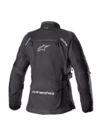 Alpinestars Stella Bogota' Pro Drystar® damejakke, sort, tekstil adventure touring-jakke set bagfra med et stort hvidt Astar-logo, opbevaringslomme på lænden med branding og reflekterende detaljer på skuldrene