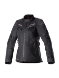 Alpinestars Stella Bogota Pro Drystar motorcykeljakke til kvinder, sort adventure touring-jakke, vandtæt tekstilkonstruktion med flere lynlåse og ventilationspaneler foran, justerbare stropper på ærmer og i taljen, diskrete røde detaljer og Alpinestars-branding.