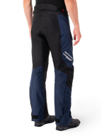 Alpinestars St-1 Waterproof Pants, Dark Blue Black and Bright Red, rear view showing black contrast panels, reflective Alpinestars logo on the side thigh, and ergonomic fit for motorcycle touring