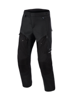 Alpinestars Cusco Drystar® bukser, adventure motorcykelbukser, sort, set forfra, med ventilationspaneler på lårene med lynlås, holdbar tekstil-ripstop-konstruktion og ergonomisk design til landevejs- og adventure touring