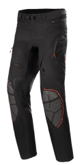 Alpinestars AMT-10R Drystar XF bukser, adventure touring motorcykelbukser, sort med orange detaljer, grå Superfabric-knæforstærkninger, justerbart taljebælte, lynlåslommer og vandtæt lamineret design