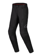 Alpinestars Stella ST-1 vandtætte bukser, adventure touring motorcykelbukser til damer, sort, med lynlåslommer foran, forstærkede knæpaneler og reflekterende Alpinestars-logo på låret, vandtæt tekstilkonstruktion med forformede ben