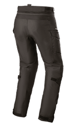 Alpinestars Stella Andes V3 Drystar® bukser til kvinder, adventure touring motorcykelbukser, sort, set bagfra med cargolommer og justerbare lægstropper, holdbar tekstilkonstruktion med vandtæt Drystar®-teknologi