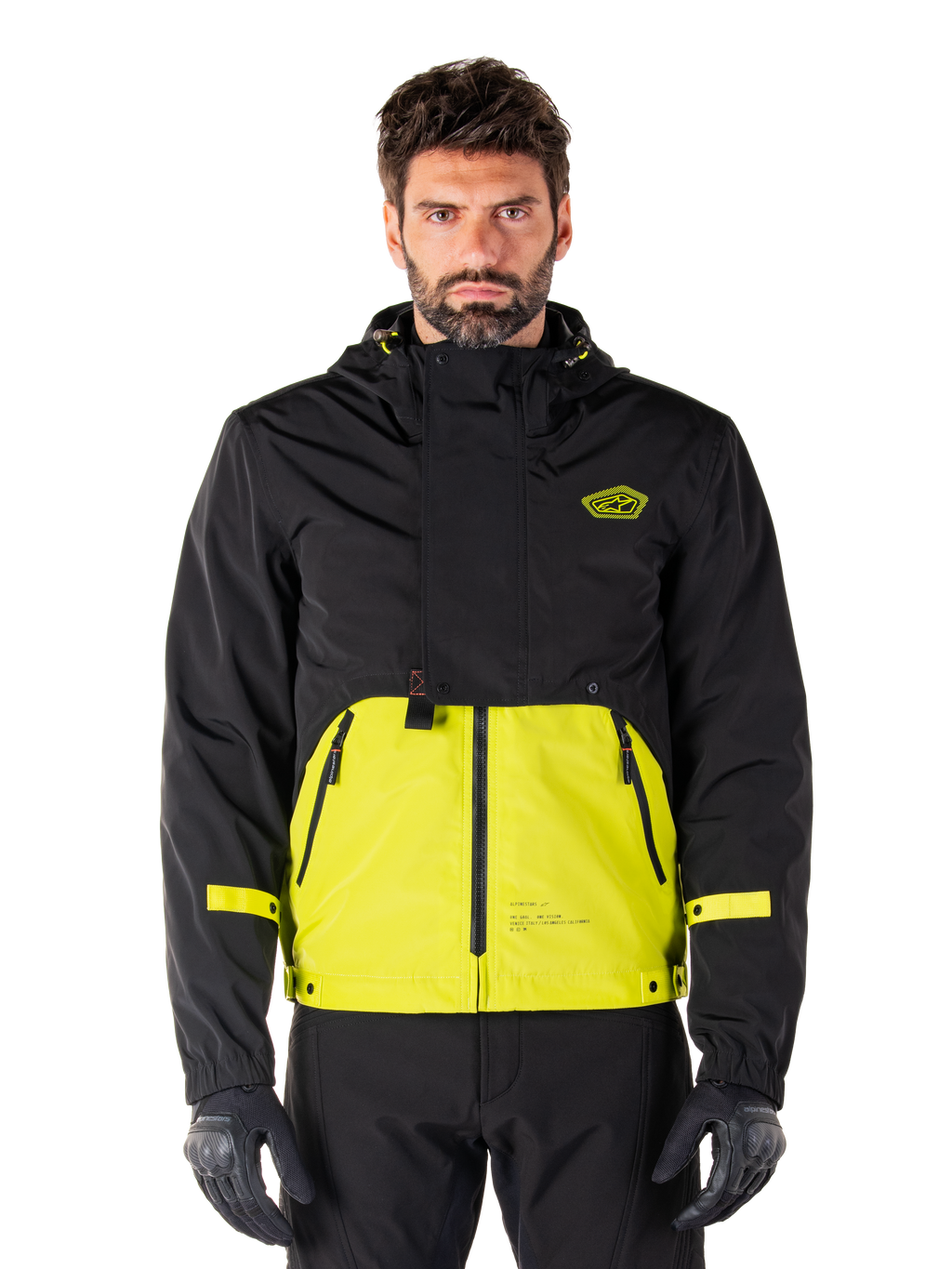 Alpinestars Mootant Waterproof Parka, motorcykeljakke, Lime Punch og sort, tofarvet design med hætte, klar gul underdel og sort overdel, gule stropper på ærmerne, logo på brystet, teknisk modulær stil