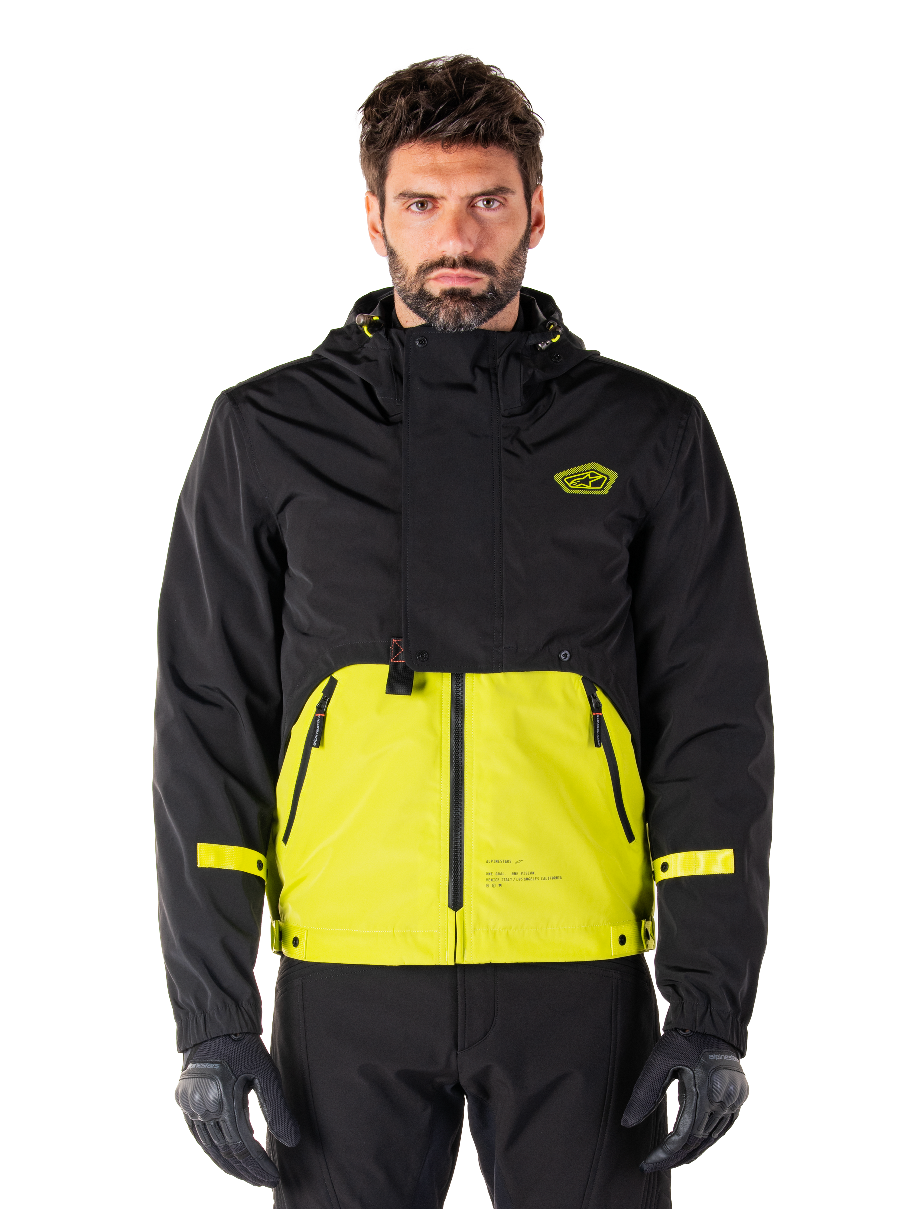 Alpinestars Mootant Waterproof Parka, motorcykeljakke, Lime Punch og sort, tofarvet design med hætte, klar gul underdel og sort overdel, gule stropper på ærmerne, logo på brystet, teknisk modulær stil