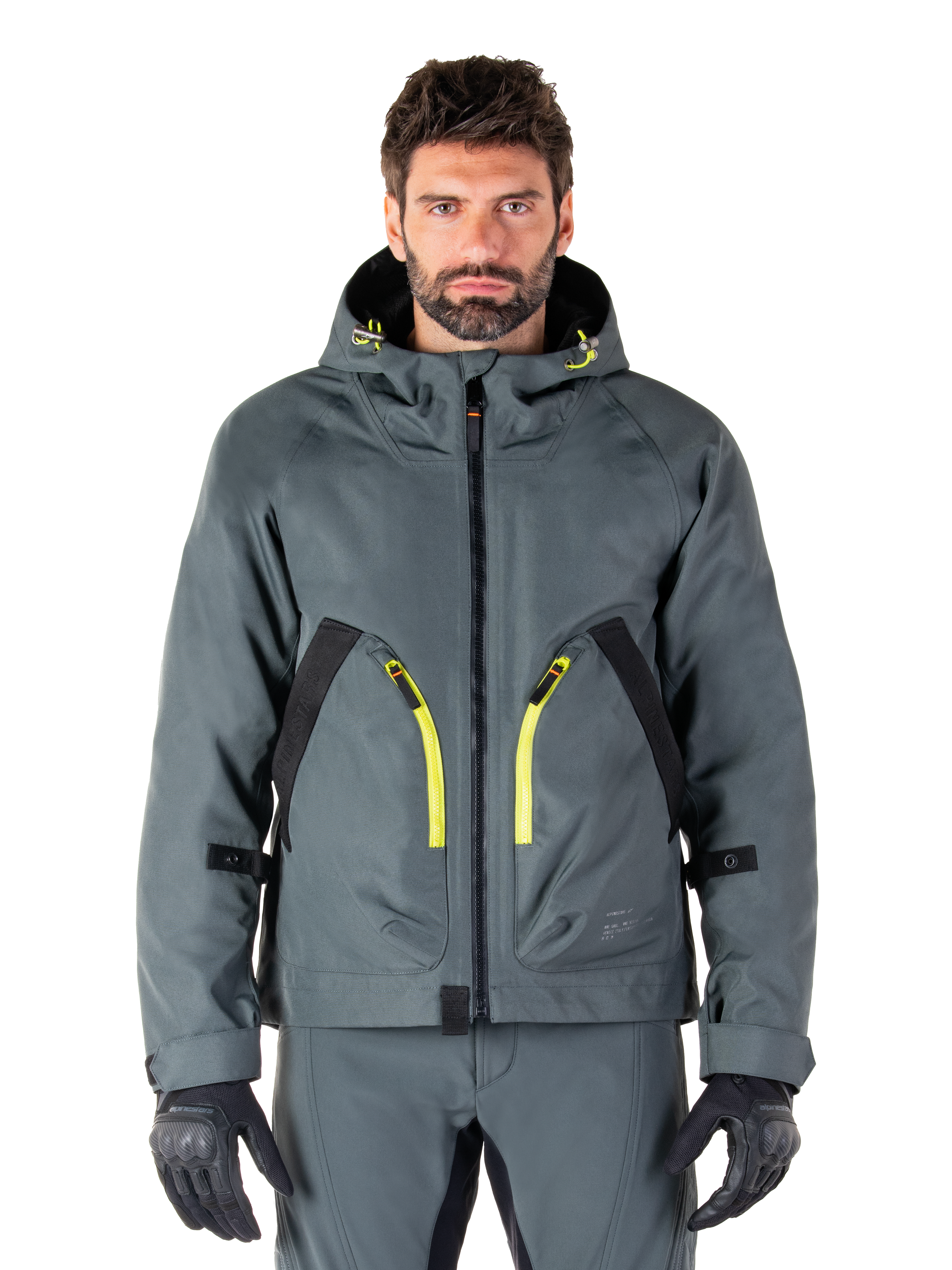 Alpinestars Morush Waterproof Parka, urban grå motorcykeljakke, iøjnefaldende gule lynlåse og sorte detaljer, design med hætte og store frontlommer, teknisk streetwear-inspireret styling