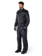 Alpinestars Hurricane Rain V2 Suit, Black, one-piece waterproof motorcycle rain suit, worn with gloves and boots, featuring reflective Alpinestars branding on the chest, lightweight design for wet weather protection