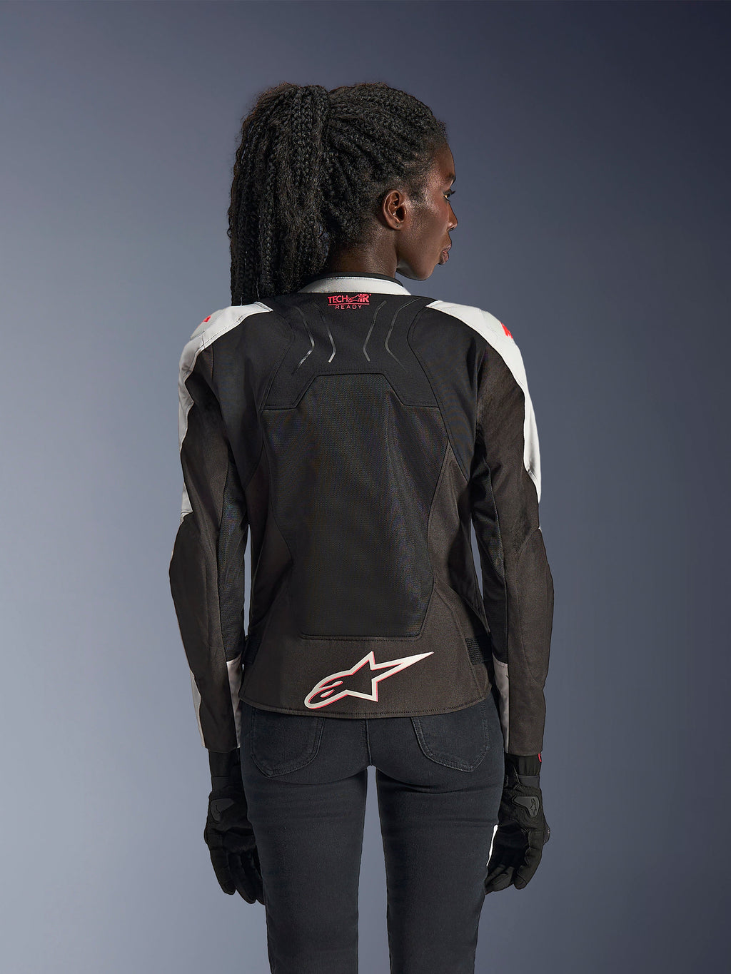 Alpinestars Stella SMX Air-jakke, motorcykeljakke til damer, Ice Gray og sort med Coral Fluo-detaljer, set bagfra med Tech-Air Ready-branding og hvidt Astar-logo, mesh-konstruktion for høj ventilation, sporty pasform