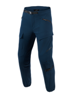 Alpinestars Juggernaut V2 Riding Pants, Urban Motorcycle Pants, Night Navy, dark blue technical riding pants with multiple zippered pockets, adjustable black waist belt, reinforced knee areas with adjustment straps, slim fit design with zippered cuffs, softshell ripstop fabric for urban commuting