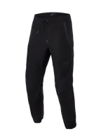 Alpinestars Aeroshell Airflow bukser, sorte, lette sport- og touring motorcykelbukser, med omfattende mesh-paneler til ventilation, elastisk talje med snoretræk, forbøjede ben og diskret tonalt logo på låret.