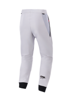 Alpinestars Aeroshell Airflow bukser, set bagfra, mellemgrå, tekniske softshell motorcykelbukser, med sorte mesh-paneler ved hofterne og elastiske manchetter, sort ASTARS-logo på underbenet, let og ventileret sportsdesign