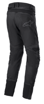 Alpinestars SP Pro bukser, tekniske motorcykel sportbukser i sort, set bagfra viser forbindelseslynlås i taljen, RIDEKNIT® stretch-indsatser på rygstykket og læggene og diskret logo-branding.