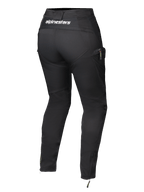 Alpinestars Actea damebukser, sort, set bagfra med hvidt logo på linningen, tilspidset silhuet med cargo-sidelomme, lynlåse ved anklerne, moderne motorcykelbukser