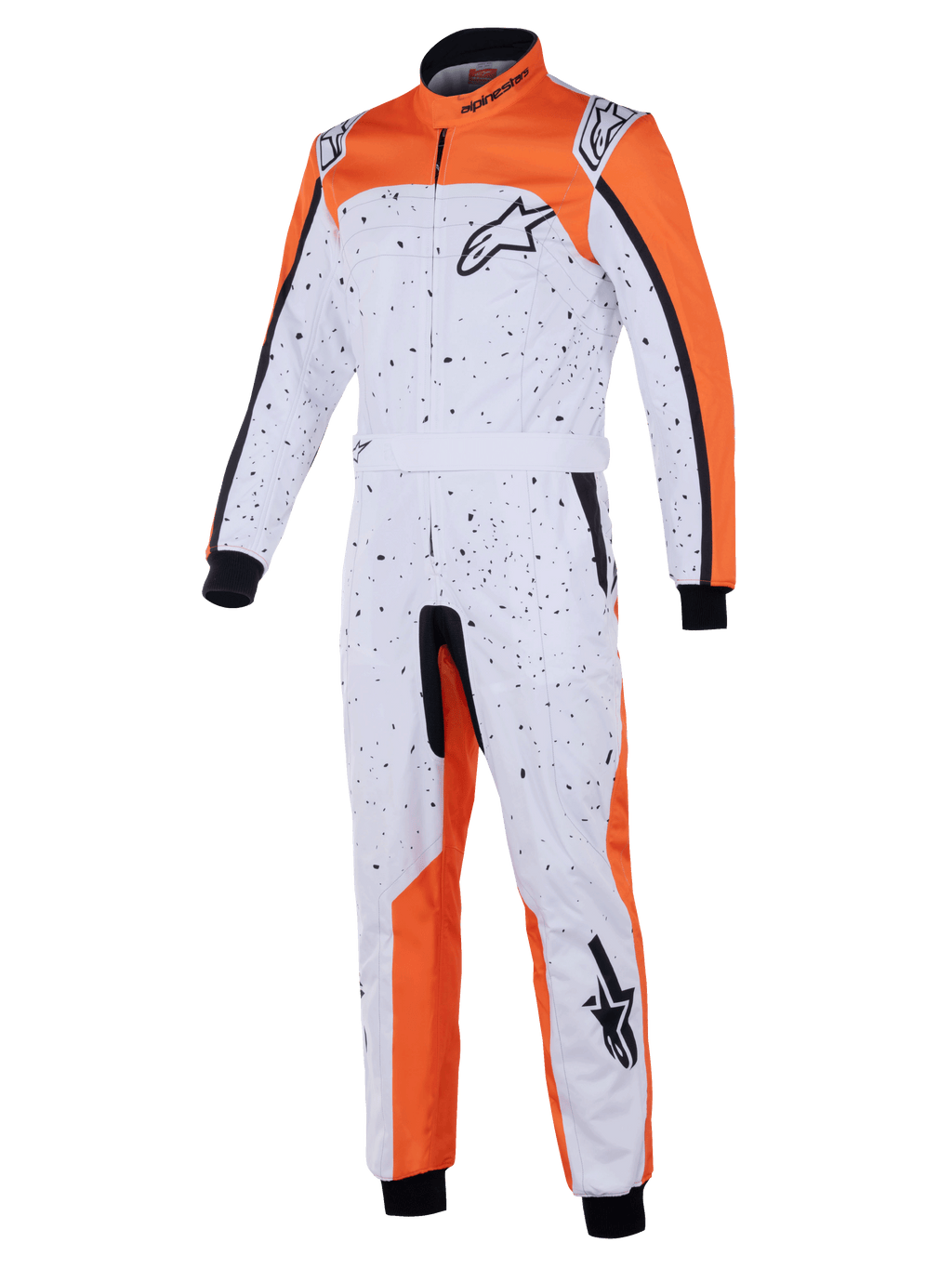 Alpinestars KMX-9 V3 Graphic 6 køredragt, kartingdragt, hvid, orange og sort, med et sort splatter-mønster, Astar-logoer på bryst og ben, strikkede manchetter og justerbart taljebælte, designet til beskyttelse ved gokartløb
