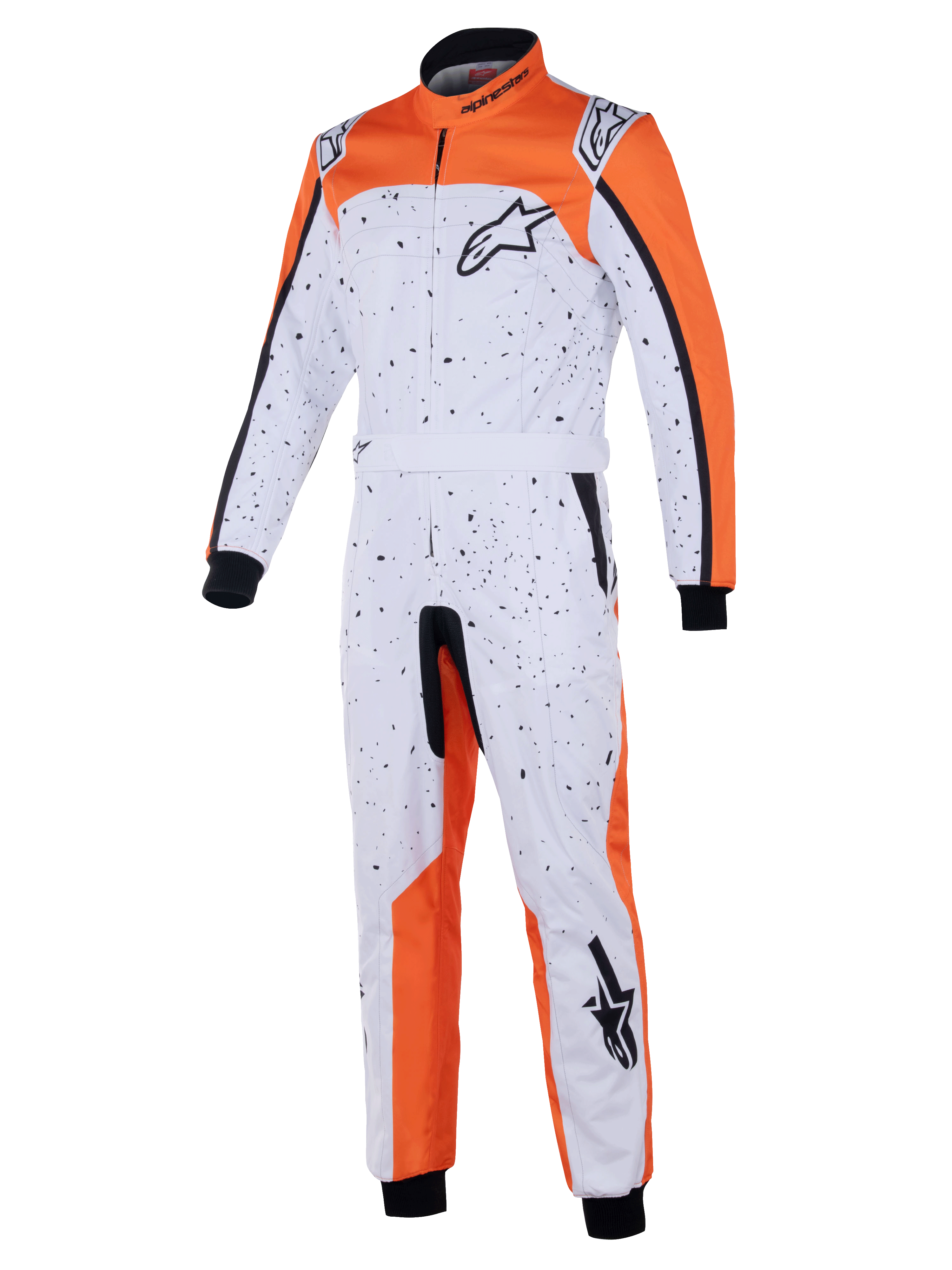 Alpinestars KMX-9 V3 Graphic 6 køredragt, kartingdragt, hvid, orange og sort, med et sort splatter-mønster, Astar-logoer på bryst og ben, strikkede manchetter og justerbart taljebælte, designet til beskyttelse ved gokartløb