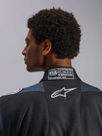 Alpinestars GP Pro Comp V2 FIA Auto Racing Suit, Black and Asphalt, with FIA 8856-2018 certification and white Astar logo.