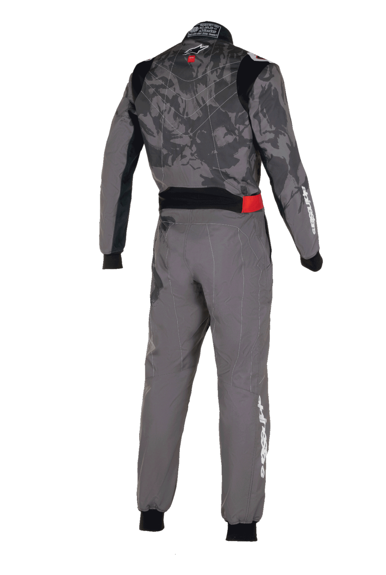 Alpinestars KMX-9 V3 Graphic 5 køredragt, kartingdragt, mørkegrå og sort, set bagfra med camouflage-mønster på overkroppen, rød detalje i taljen og hvid Alpinestars-branding på ærme og ben