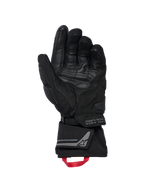 Alpinestars WT-8 GORE-TEX isolerede handsker, motorcykelhandsker, sort, visning af indersiden af håndfladen med forstærkede læderstykker og polstrede slidere, lang manchet med rød trækstrop og Alpinestars Exploration Equipment-branding med geografiske koordinater, teknisk vej- og adventure-design