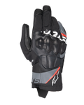 Alpinestars Corozal V3 Drystar handsker, adventure motorcykelhandsker, sort med mørkegrå og rød fluo detaljer, set oppefra med læderdækket SP-knobeskytter, tekstil- og læderkonstruktion og kort manchetdesign, vandtæt adventure-udstyr
