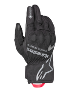 Alpinestars Crestone GORE-TEX isolerede handsker, sorte motorcykel touringhandsker, vandtæt og åndbar tekstil håndryg, integreret knobeskyttelse, sølvfarvet Alpinestars-logo og koordinater, rød trækstrop