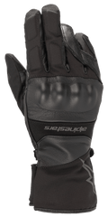 Alpinestars Range 2 In One GORE-TEX Glove With Goregrip Tech, Black motorcycle glove, back of hand view featuring a molded knuckle protector, leather and fabric construction, long cuff with Alpinestars branding, waterproof adventure touring gear