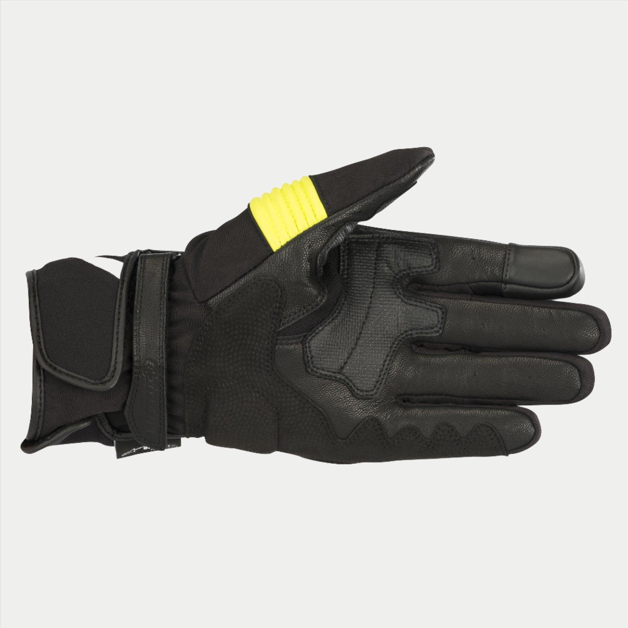 Alpinestars T-SP W Drystar® Gloves, Black and Yellow Fluo, palm view showing goat leather construction with yellow fluorescent accents on the thumb, touchscreen compatible fingertips, and double hook and loop wrist closure.