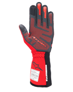 Alpinestars Tech-1 ZX V4 Gloves, Auto Racing Gloves, Black and Red, palm side showing red 3D silicone grip patterning and FIA/SFI homologation labels on the cuff, designed for high-performance motorsport